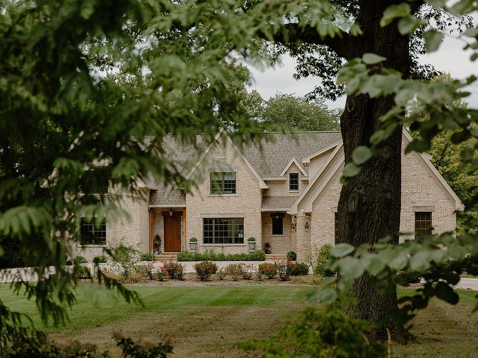 Storybook Perfect.  This enchanting property exudes a stately beauty mingled with the warmth and sec