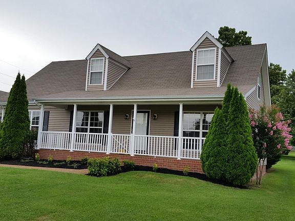 Nice yard with lawn care included in rent! No more mowing!