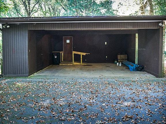 Covered Carport with storage and room for 2 vehicles
