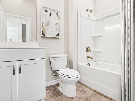 Secondary Bathroom with a soaking tub.