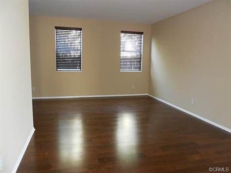 wood floor in living room and entry way