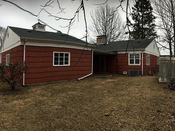 back with covered area ans storage shed