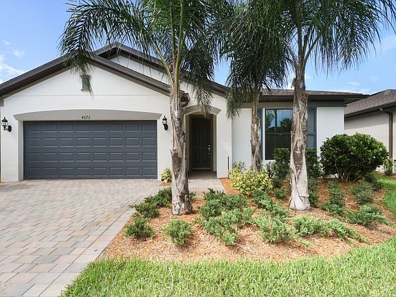 Oasis, a single-story home with 2 car garage