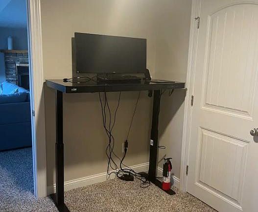 Standup Desk with separated office area.