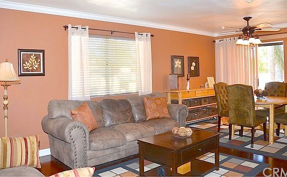 Another View of the Living Room Level looking towards Dining Area and Walk Out Balcony