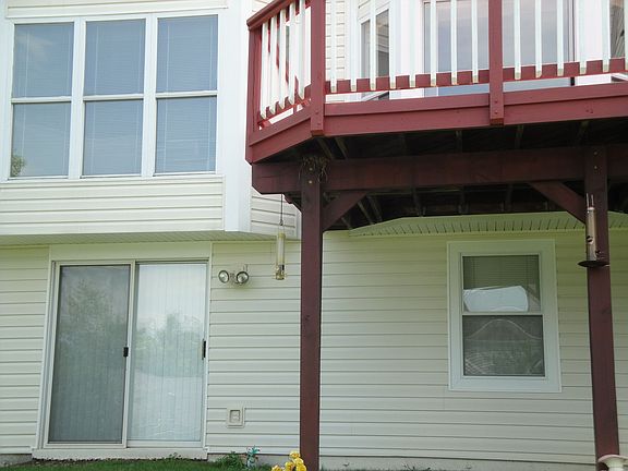 Walk-out basement with custom window for extra lighting.