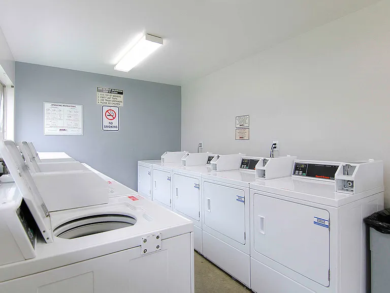 Community laundry room. Additionally, every individual private garage has their own washer and dryer hook up.