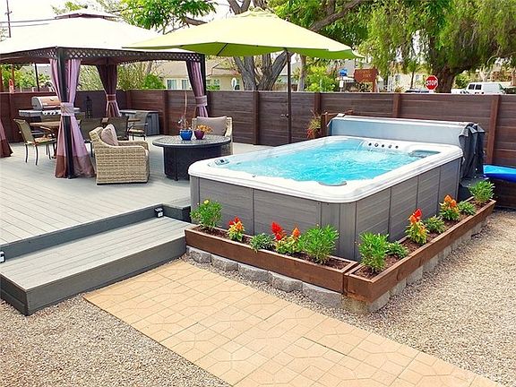 Swim spa and deck patio area are low maintenance