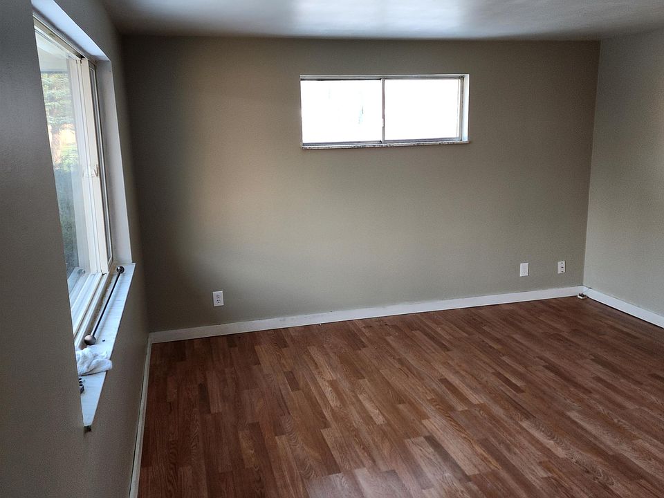 Spacious living area when you first walk in with plenty of natural lighting.