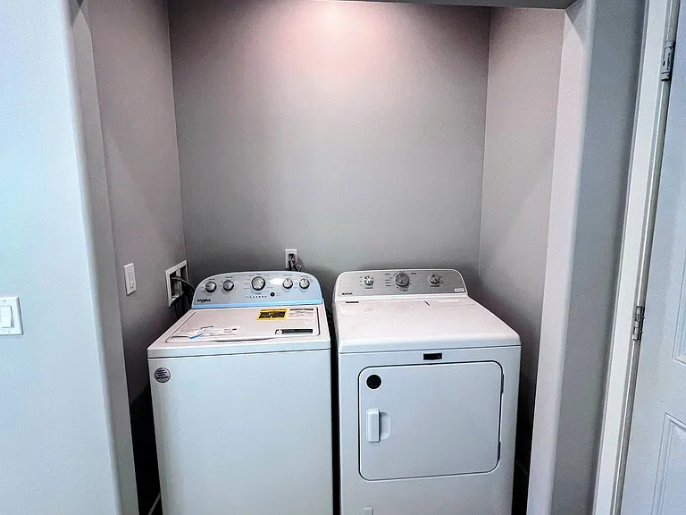 New washer and dryers in unit. Sliding doors will be installed.