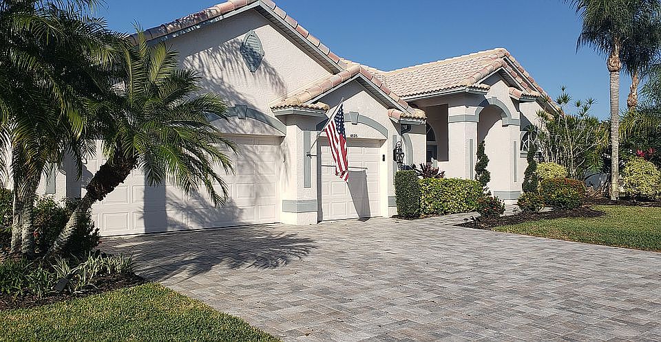 Front of home. 3 Car garage.
