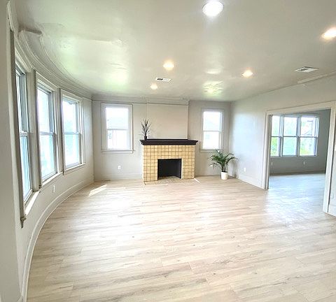 Large living room gives way to equally spacious dining room.