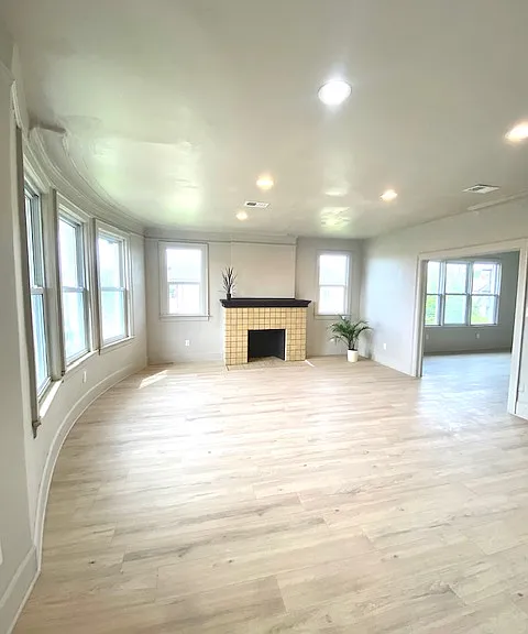 Large living room gives way to equally spacious dining room.