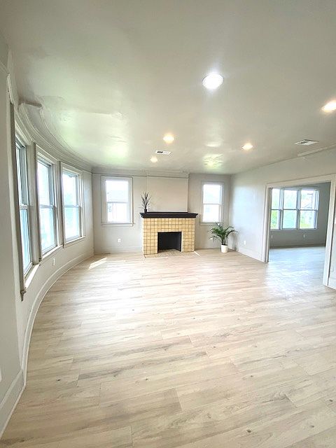 Large living room gives way to equally spacious dining room.