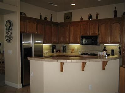 Stainless & wood...lots of storage.