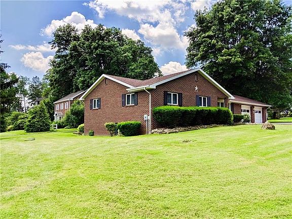 Corner view of property. Large flat land, the options are endless of what you could do, Plenty room for your pool or jacuzzi!