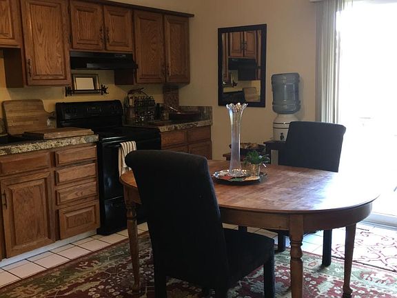 Kitchen W/North Deck and Storage Closet
