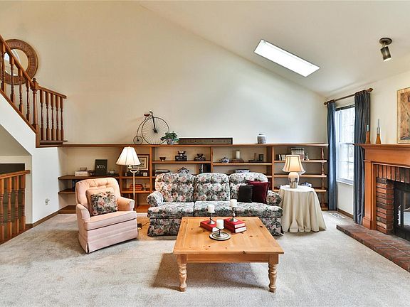 Great room also has wonderful built-in bookcases and large gas fireplace