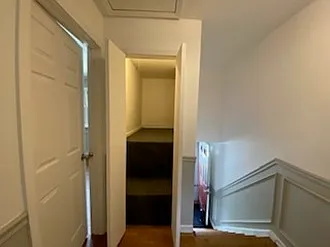 Storage closet and staircase