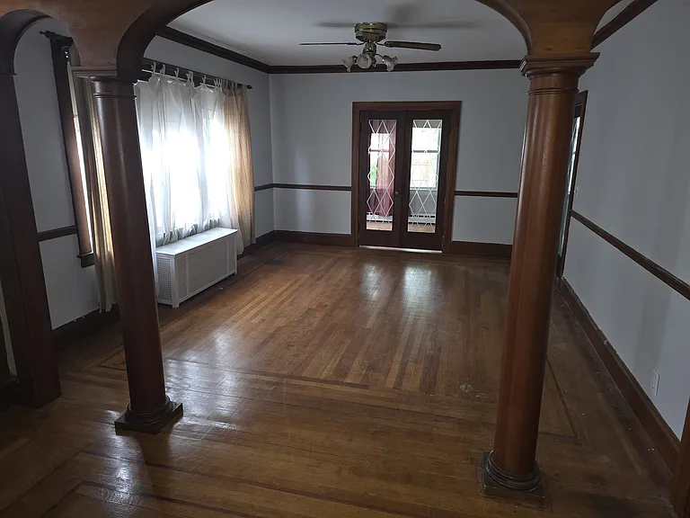 Formal dining room with original hardwood flooring