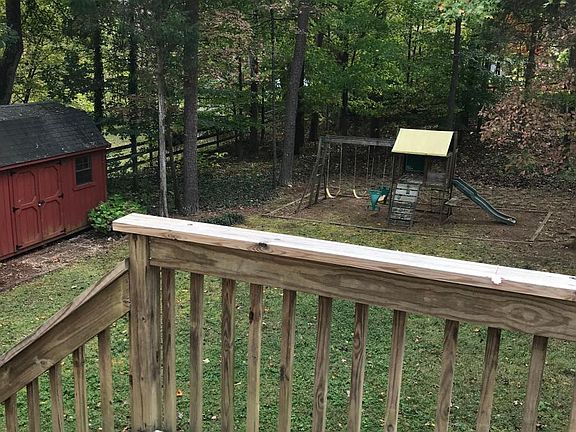 Large deck with fenced in yard