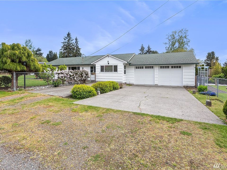 Welcome home!  Large lot, fully fenced, plenty of parking, and beautiful landscaping
