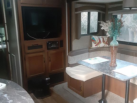 Kithcen has a skylight and surround windows in dinning area.lot of natural light.