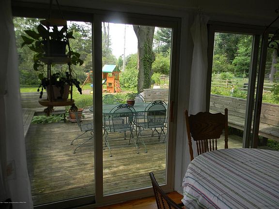 View from sun room to backyard