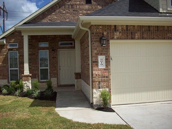 Closer view of your new front porch as you approach your new home with landscaping.
