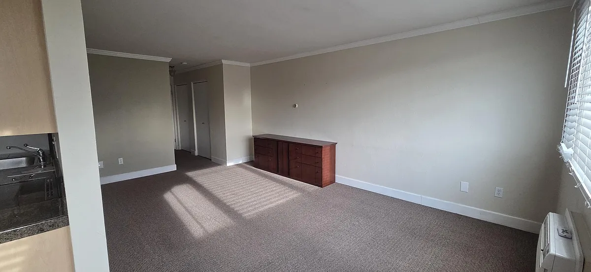 Large pantry and full kitchen separate from living space. - 969 S Pearl St #304