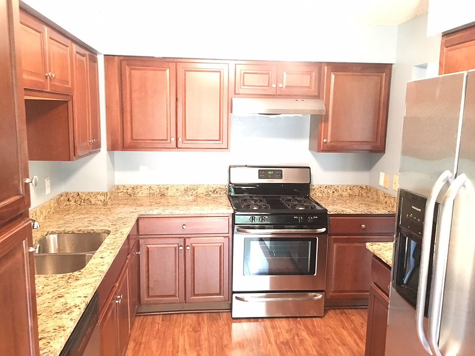 new cabinets, granite countertops, garbage disposal
