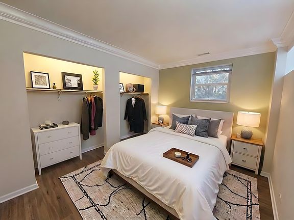 Master bedroom with built-in closet extending entire wall length! 

Room has been virtually staged. All fixtures, finishes and appliances are true to life.