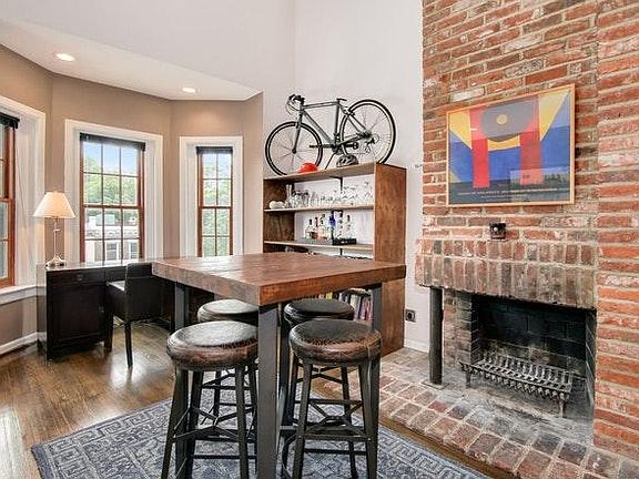Working fire place with exposed brick