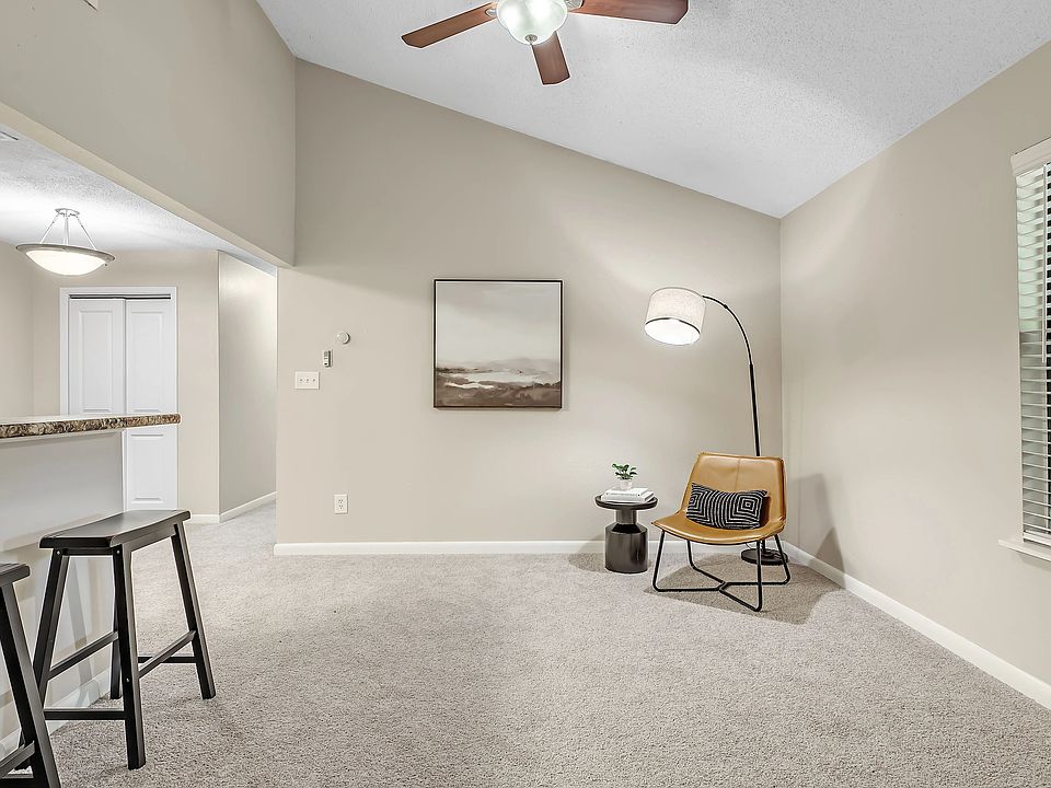 Immerse yourself in the comfort of our substantial living rooms adorned with plush carpeting and a refreshing ceiling fan.