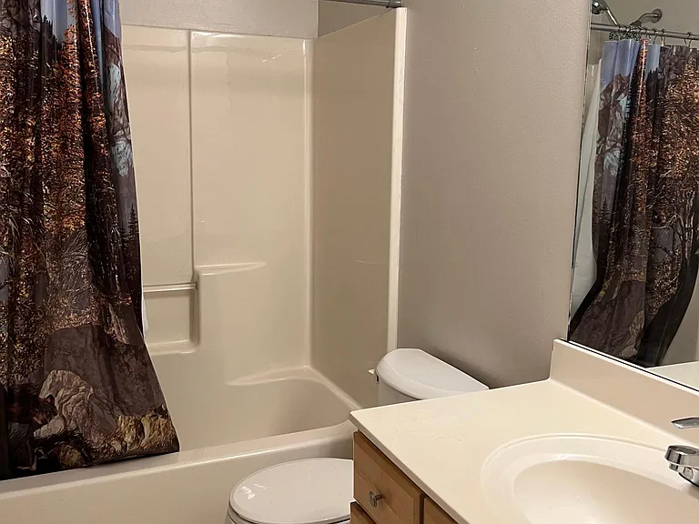 Second full bath located upstairs next to the second and third bedrooms