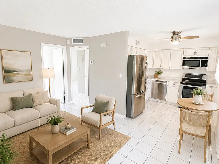 Open concept dining and living room area.