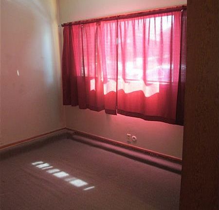 1709 Harvard, back of main room