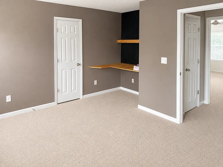 Built in desk in cubby of room