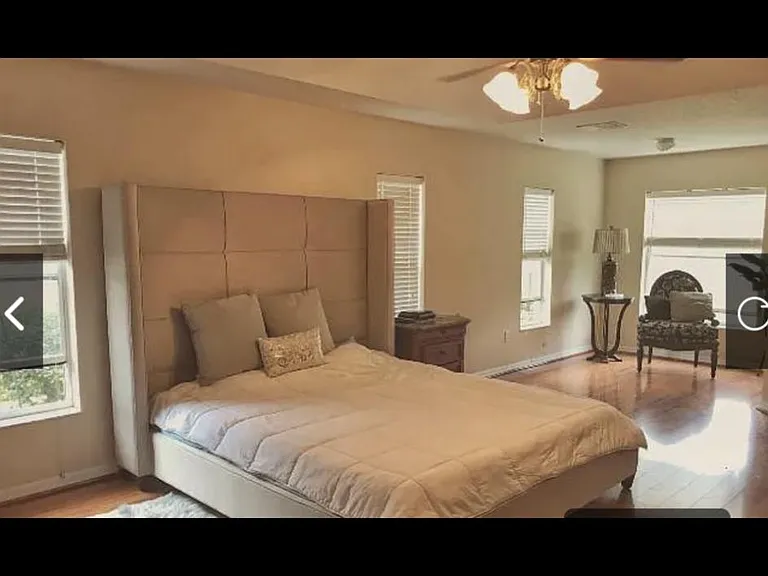 Luxury Master bedroom with california king bed