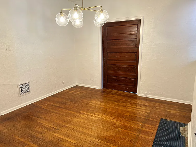 Dining room, looking back at living room with pocket door closed for more privacy.