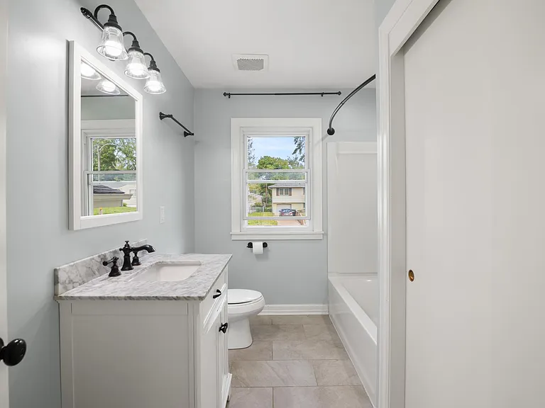 7917 Grover St — Photo 12
