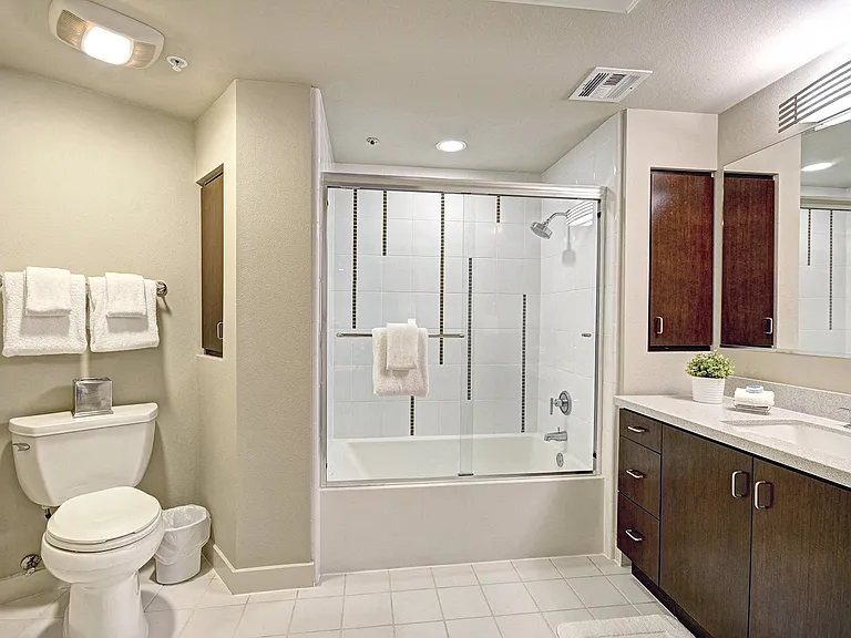 Modern bathrooms with ceramic tile and oversized tubs