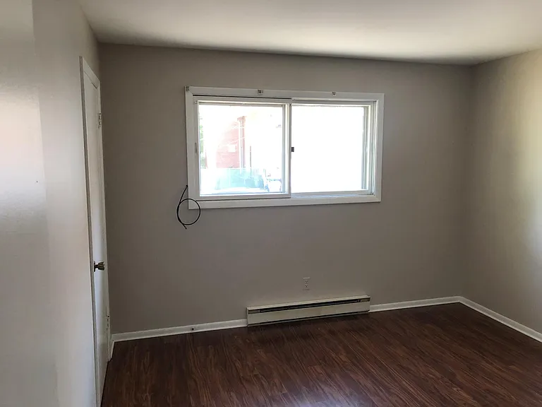 Big, bright, warm bedrooms with lovely new floors and plenty of streaming natural light!