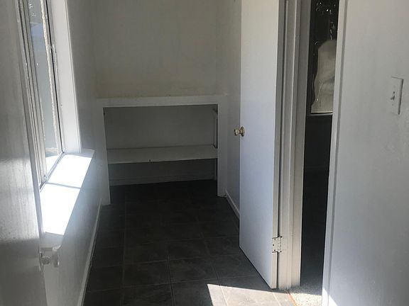 Half room of one of the bedrooms