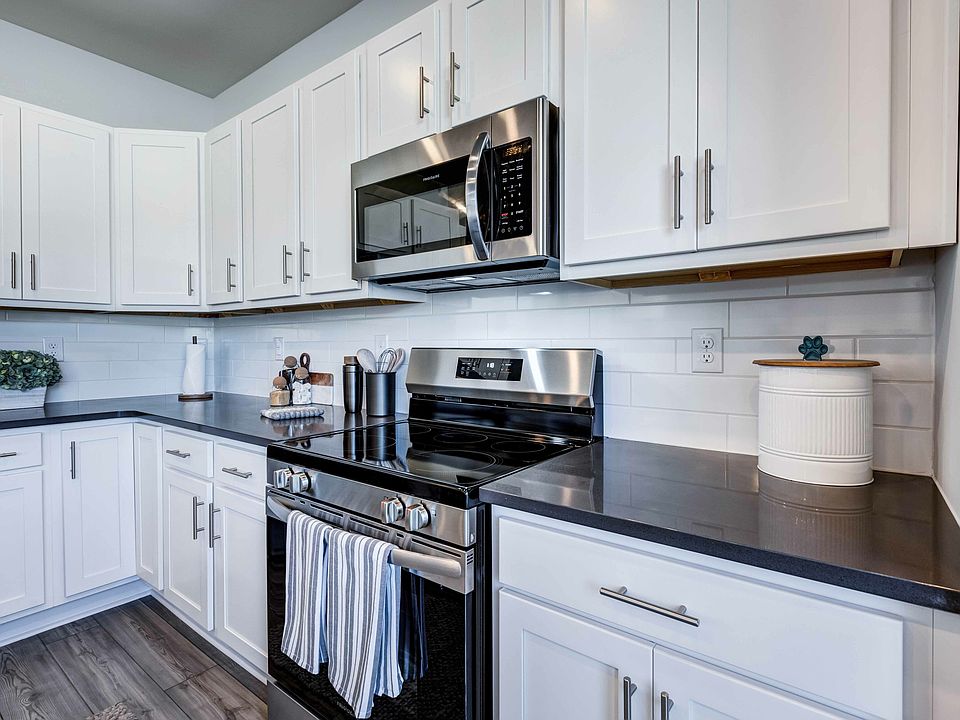 Experience the perfect blend of charm and technology in your cottage's beautiful kitchen, equipped with smart home features, including convenient USB outlets.