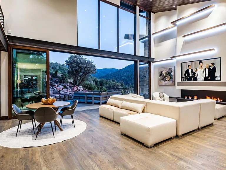 Great Room with 85" TV and multiple seating areas