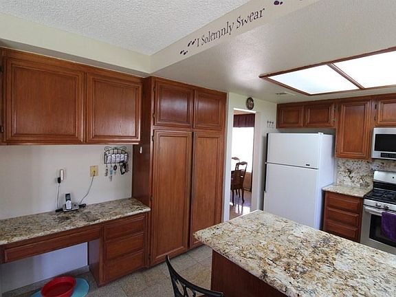 Oversized Pantry with a built-in Desk. Perfect for kids to do their homework while the parents are preparing diner.
