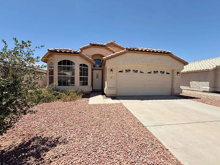 9821 W Yukon Dr — Photo 1