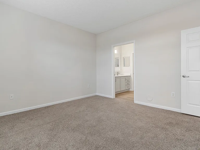 The Charleston Magnolia Premium Renovated Plush carpet in bedrooms