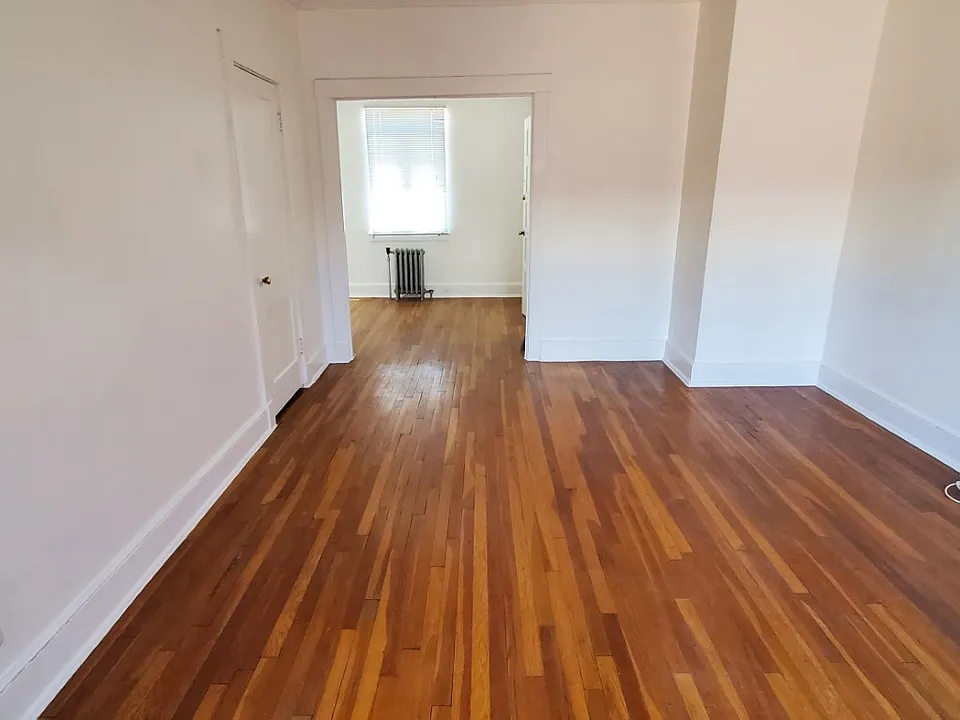 living room with dining room at end